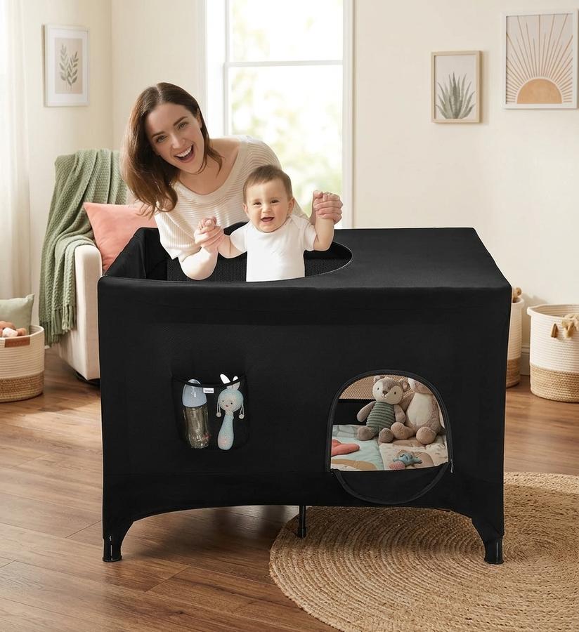 Pack N Play blackout cover stretched over a hotel travel crib